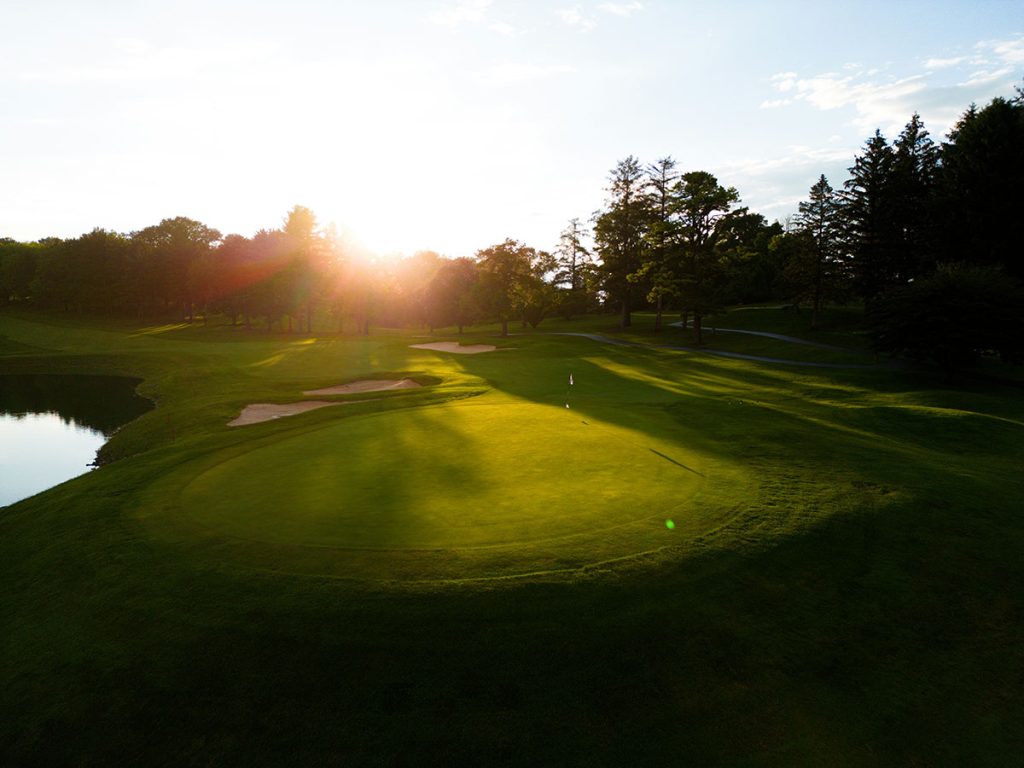 Panoramic view of a lush green golf course at Anthem Golf & Country Club - Ironwood Course. Smooth
