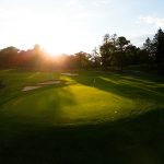 Panoramic view of a lush green golf course at Anthem Golf & Country Club - Ironwood Course. Smooth