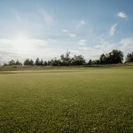Panoramic view of a lush green golf course at Chennault Park Golf Course. Smooth