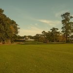 Panoramic view of a lush green golf course at Crooked Oak Golf Club of Colquitt. Smooth