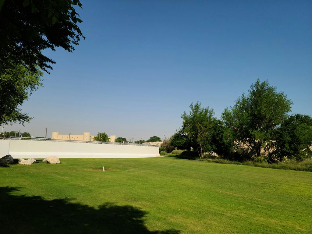 Panoramic view of a lush green golf course at Deer Valley Golf Club. Smooth