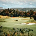 Panoramic view of a lush green golf course at Emporia Golf Course. Smooth