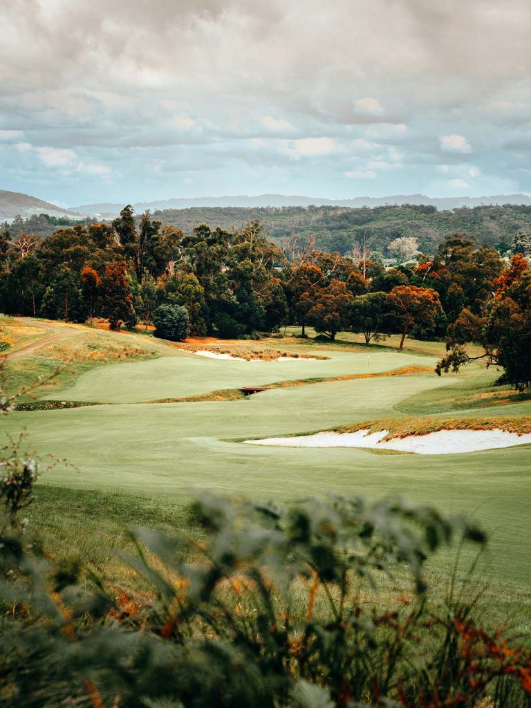 Panoramic view of a lush green golf course at Emporia Golf Course. Smooth