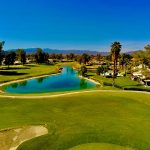 Panoramic view of a lush green golf course at Esplanade Golf and Country Club at Lakewood Ranch (Members Only). Smooth