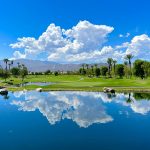 Panoramic view of a lush green golf course at Fort Hays Municipal Golf Course. Smooth