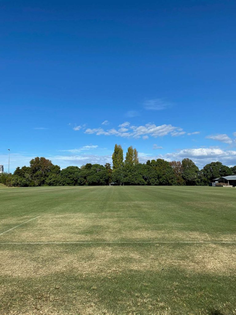 Panoramic view of a lush green golf course at Glendale Lakes Golf Club. Smooth