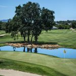 Panoramic view of a lush green golf course at Greystone Golf and Country Club. Smooth