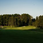 Panoramic view of a lush green golf course at Hayden Public Golf Course. Smooth