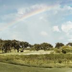 Panoramic view of a lush green golf course at Knickerbocker Golf Club