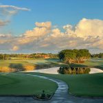 Panoramic view of a lush green golf course at North Haven Golf Club. Smooth