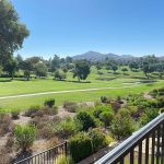 Panoramic view of a lush green golf course at Northwestern Hills Golf Course. Smooth