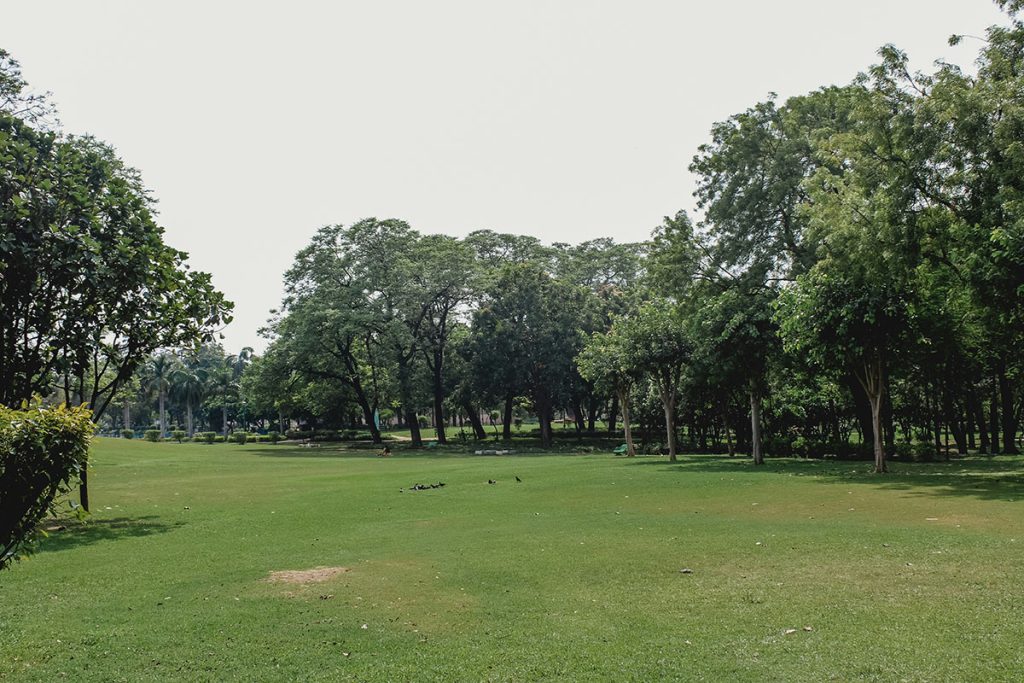 Panoramic view of a lush green golf course at Oak Run Public Golf Course. Smooth