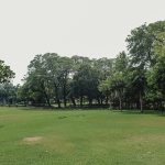 Panoramic view of a lush green golf course at Oak Run Public Golf Course. Smooth