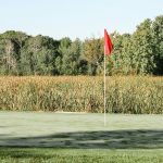 Panoramic view of a lush green golf course at Orchard Valley Golf Course & Banquet Hall. Smooth