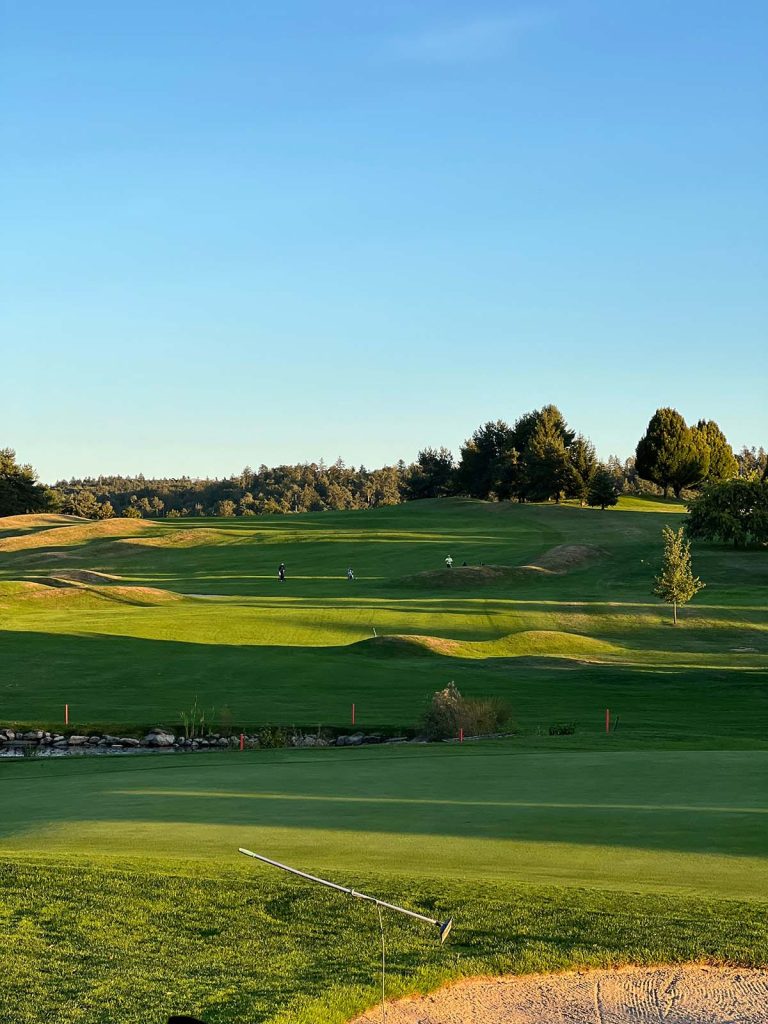 Panoramic view of a lush green golf course at Scottsdale Country Club Golf Course. Smooth