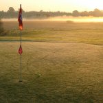 Panoramic view of a lush green golf course at Sim Park Mun Golf Course Maintenance. Smooth
