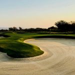 Panoramic view of a lush green golf course at Steelwood. Smooth