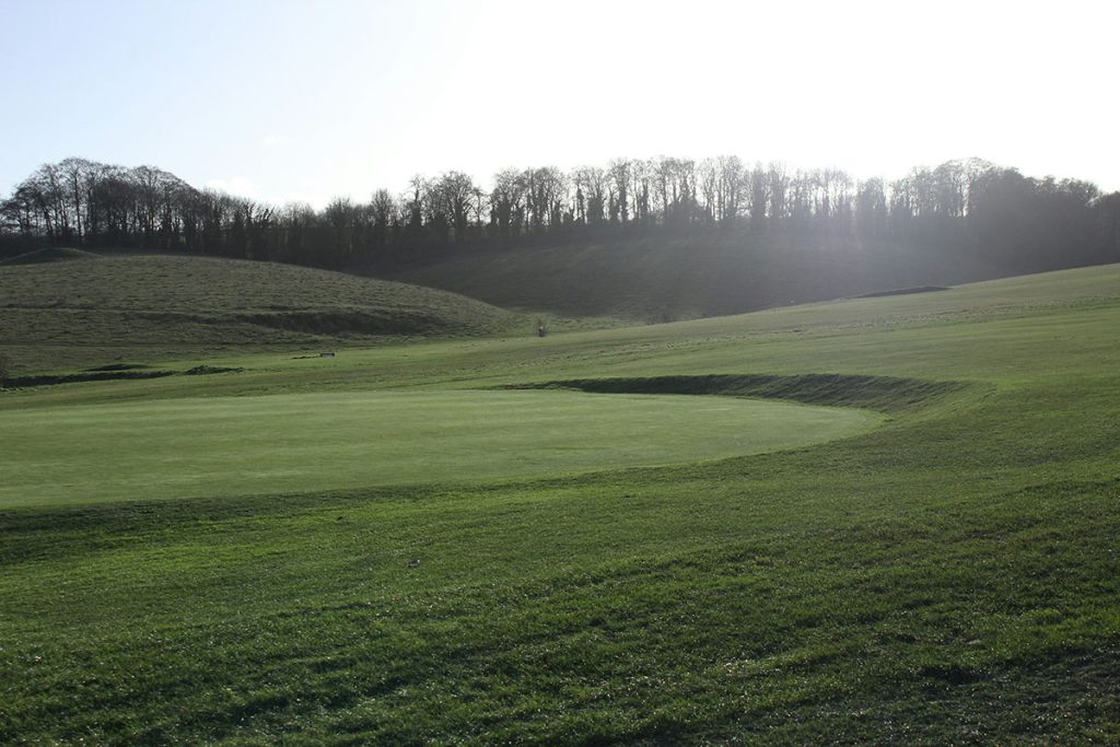 Panoramic view of a lush green golf course at The Greens on Blossom Way Golf and Country Club. Smooth