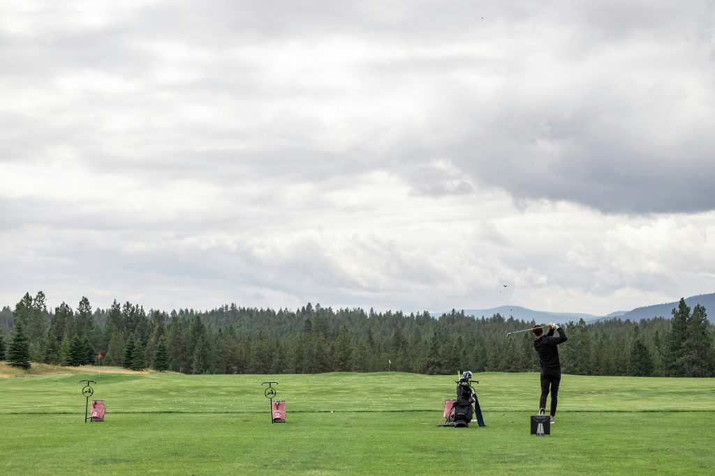 Panoramic view of a lush green golf course at The Links Golf Course. Smooth