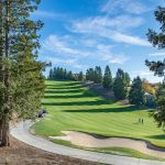 Panoramic view of a lush green golf course at The Venice Golf and Country Club. Smooth