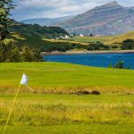 Panoramic view of a lush green golf course at Wellington Golf Club. Smooth