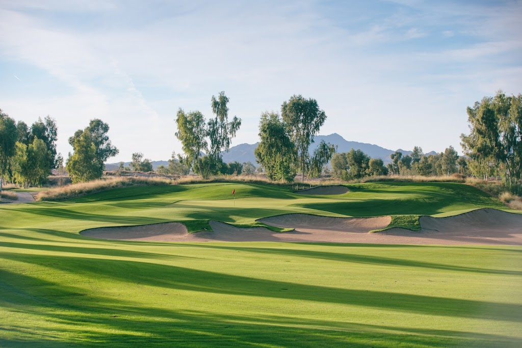 Panoramic view of a lush green golf course at Ak-Chin Southern Dunes Golf Club. Smooth