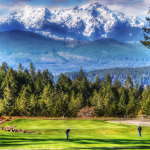 Panoramic view of a lush green golf course at Alderbrook Golf and Yacht Club. Smooth