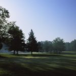 Panoramic view of a lush green golf course at Algonkian Golf Course. Smooth