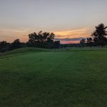 Panoramic view of a lush green golf course at Allentown Municipal Golf Course. Smooth