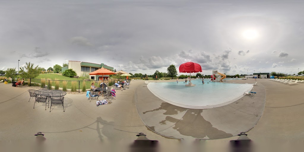 Panoramic view of a lush green golf course at Ames Golf & Country Club. Smooth
