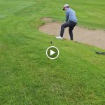 green grass with the flag in the hole.