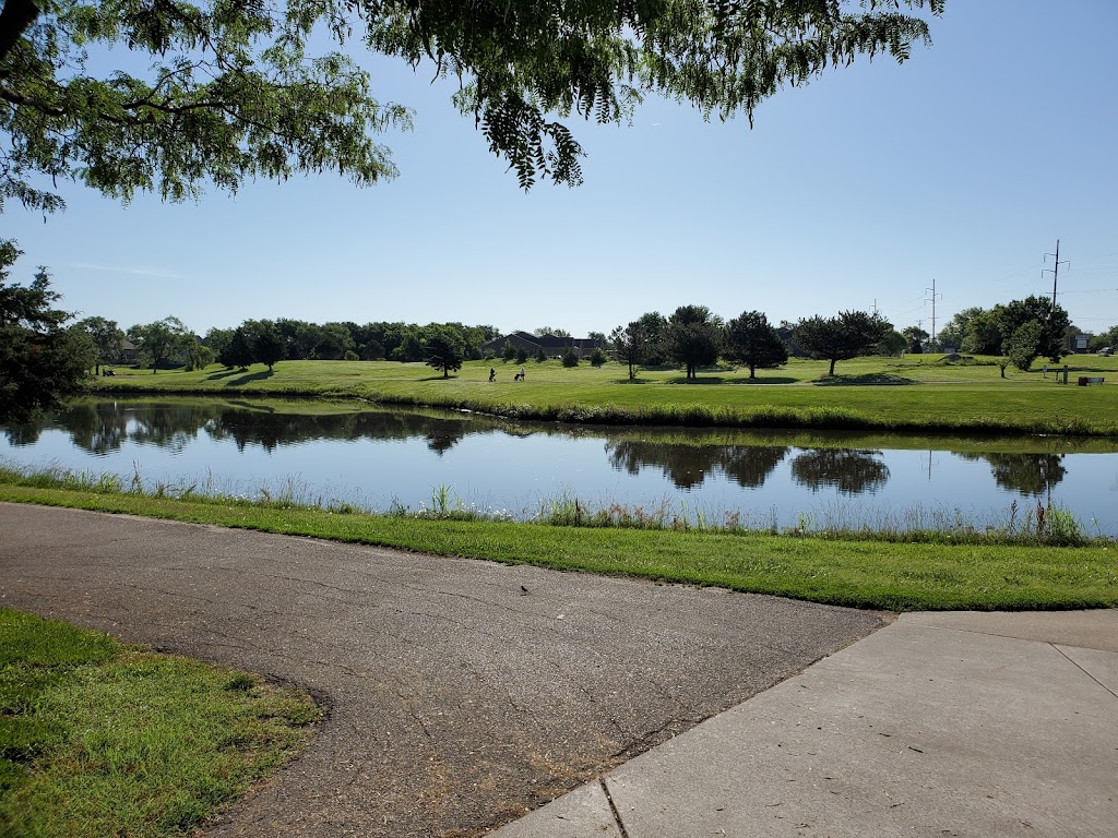 Panoramic view of a lush green golf course at Andover Municipal Golf Course. Smooth