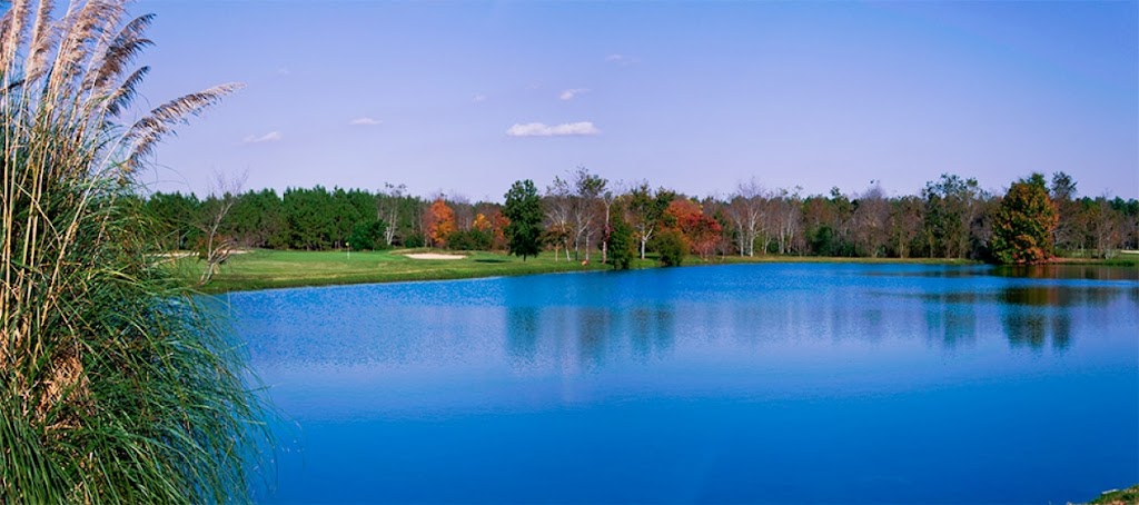 Panoramic view of a lush green golf course at Applewood Golf Course. Smooth