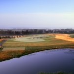 Panoramic view of a lush green golf course at Architects Golf Club. Smooth
