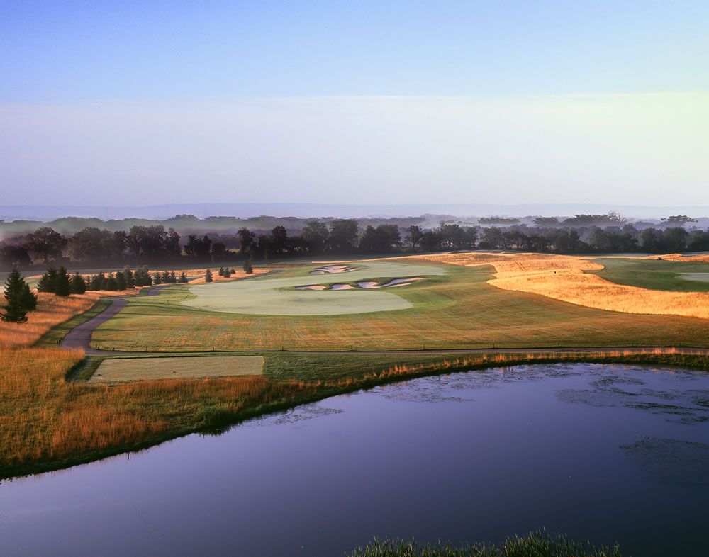 Panoramic view of a lush green golf course at Architects Golf Club. Smooth