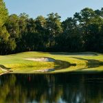 Panoramic view of a lush green golf course at Ardea Country Club. Smooth