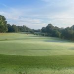 Panoramic view of a lush green golf course at Aroostook golf course. Smooth