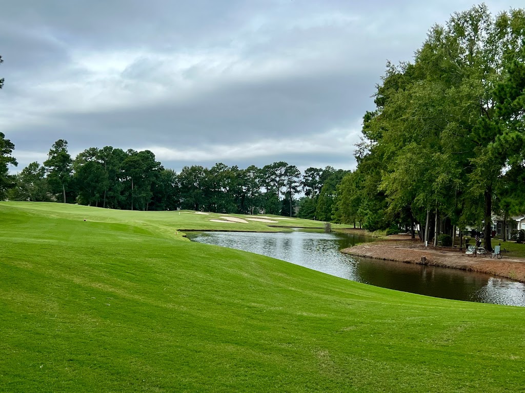 Panoramic view of a lush green golf course at Arrowhead Country Club. Smooth