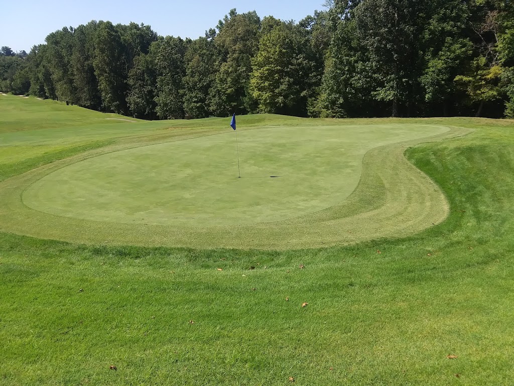 Panoramic view of a lush green golf course at Arrowhead Golf Course. Smooth