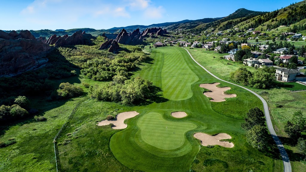 Panoramic view of a lush green golf course at Arrowhead Golf Course. Smooth