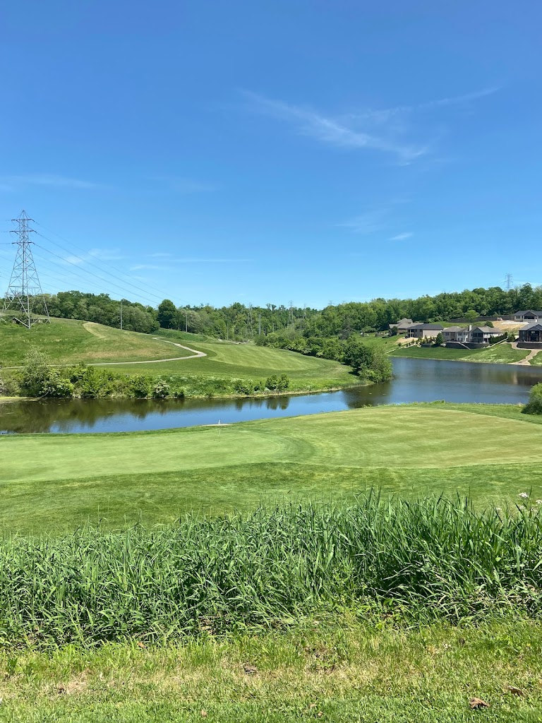 Panoramic view of a lush green golf course at Aston Oaks Golf Club. Smooth