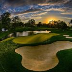 green grass with the flag in the hole.