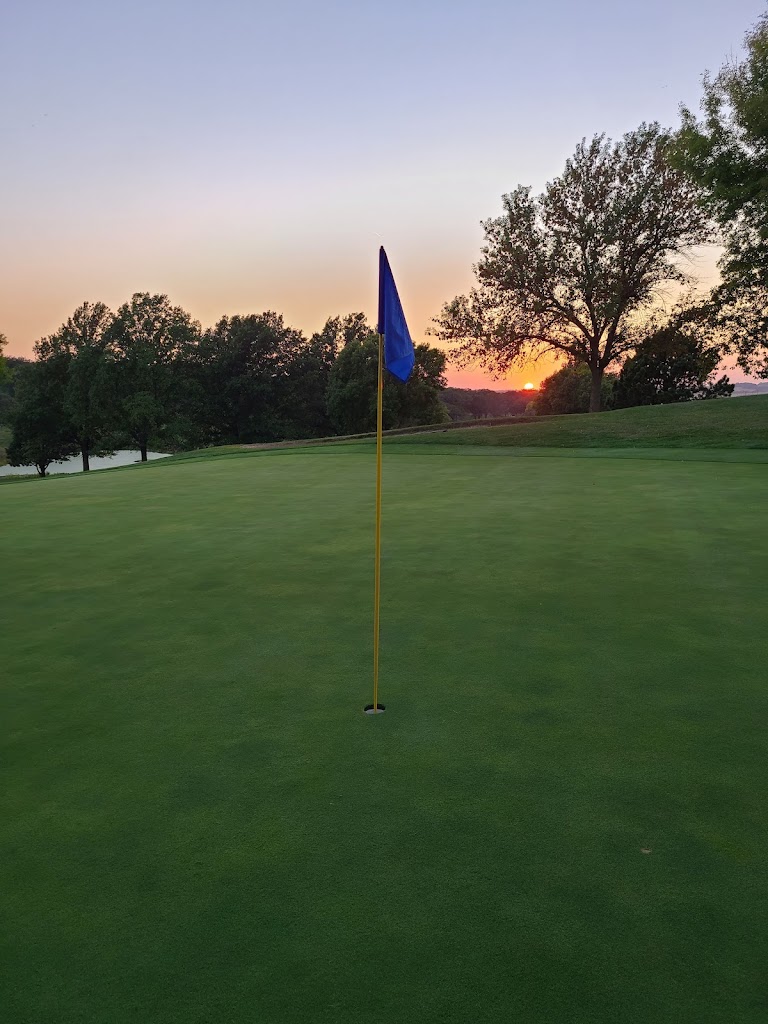 Panoramic view of a lush green golf course at Atlantic Golf & Country Club. Smooth