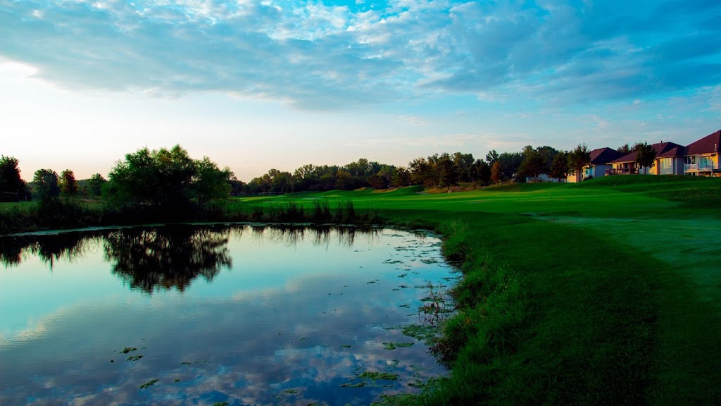 Panoramic view of a lush green golf course at Auburn Hills Golf Course. Smooth
