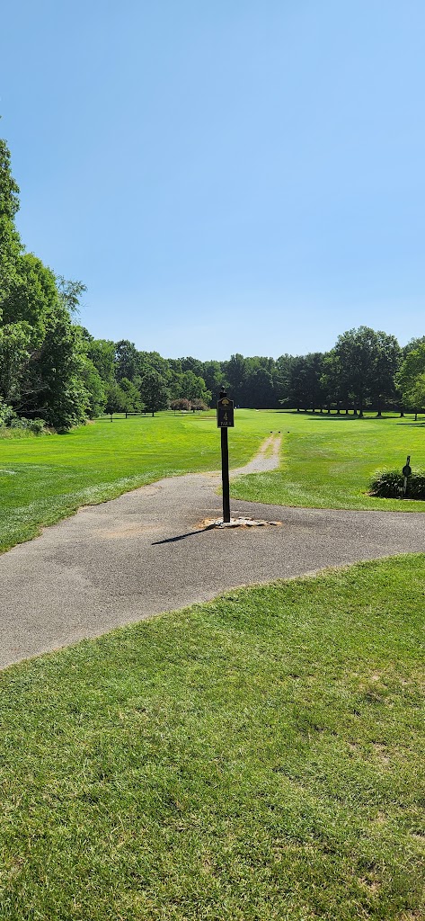 Panoramic view of a lush green golf course at Avalon Field Club at New Castle. Smooth