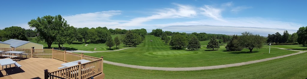 Panoramic view of a lush green golf course at Avoca CountryView Golf and Grille. Smooth