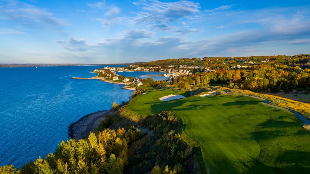Panoramic view of a lush green golf course at BOYNE Golf - Michigan. Smooth