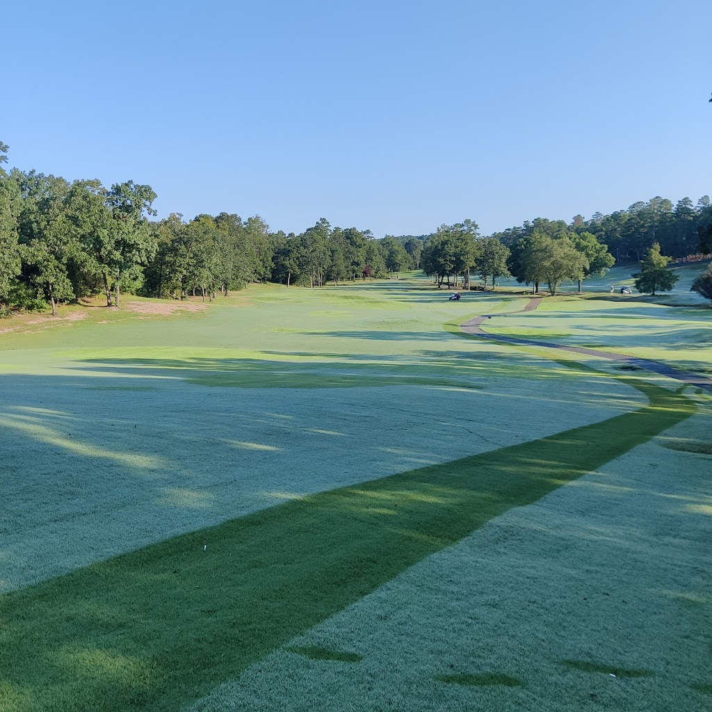Panoramic view of a lush green golf course at Balboa Golf Course. Smooth