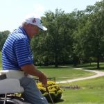 green grass with the flag in the hole.