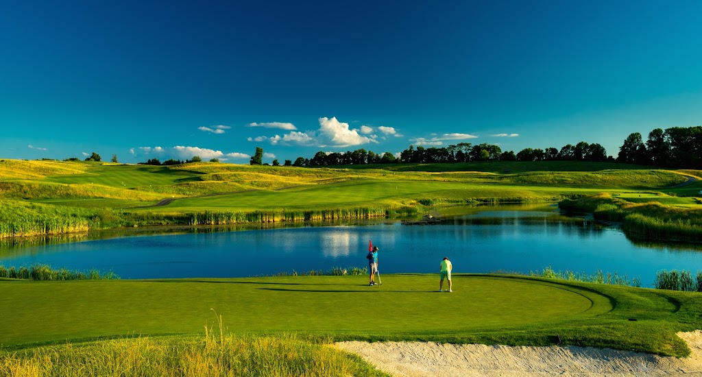 Panoramic view of a lush green golf course at Ballyowen Golf Club. Smooth